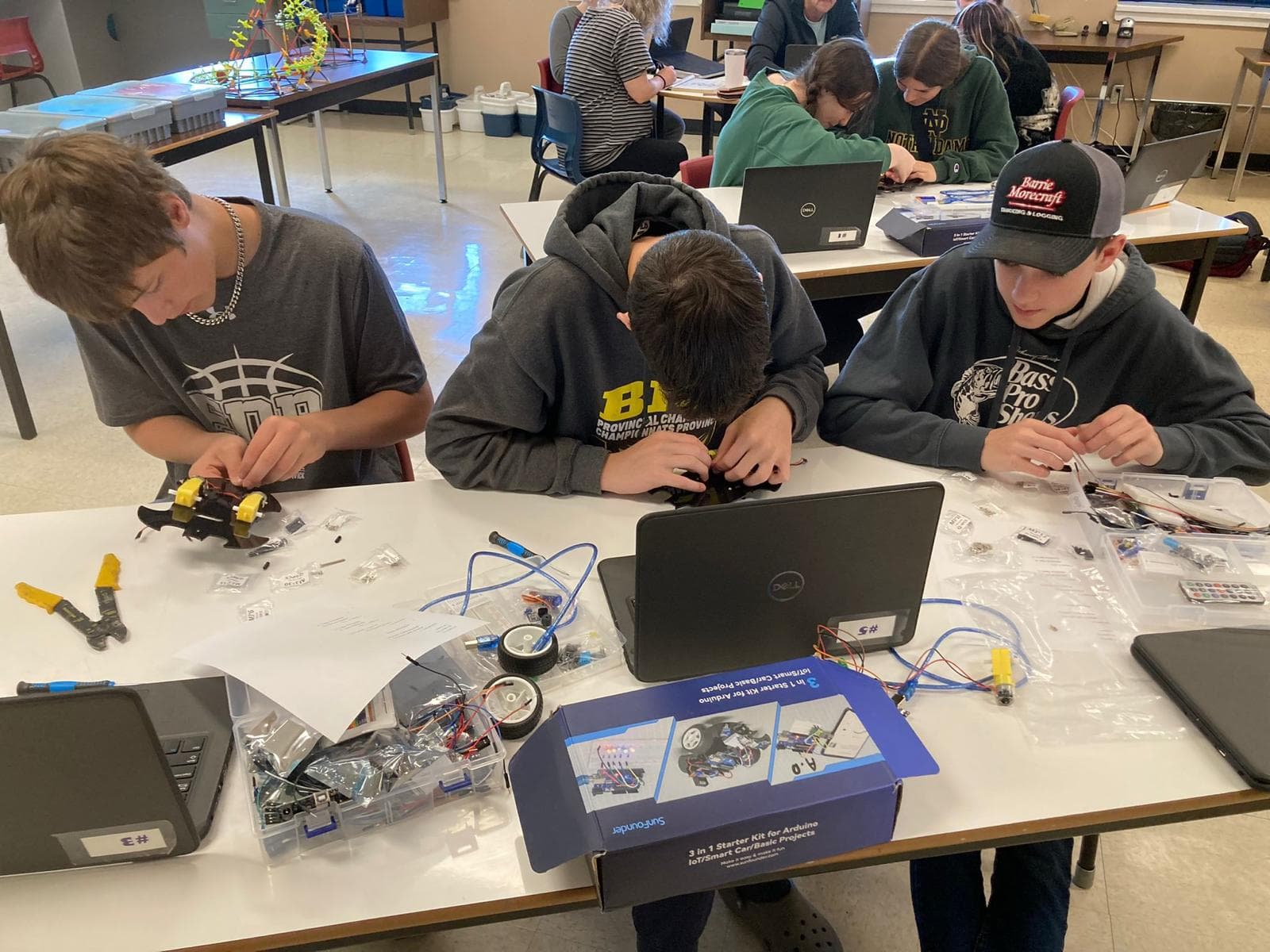 Student building a robot
